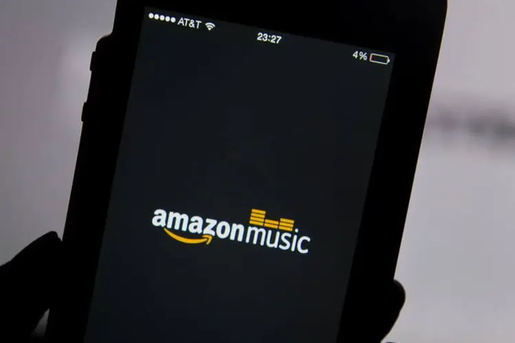 
	Logo do aplicativo de m&uacute;sica da Amazon em um iPhone 5, da Apple
 (David Paul Morris/Bloomberg/Bloomberg)