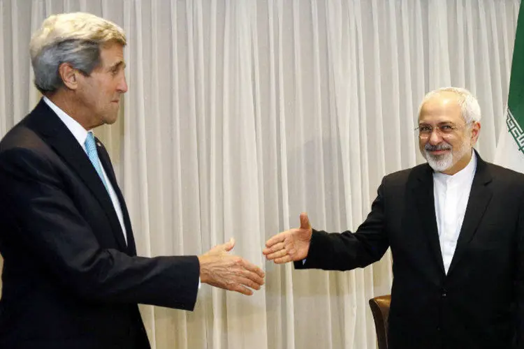 
	John Kerry e Mohammad Javad Zarif: os dois retomaram as conversas na cidade de Montreux, na Su&iacute;&ccedil;a, esperando entrar em um acordo at&eacute; o final de mar&ccedil;o
 (Rick Wilking/Reuters)