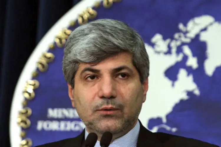 
	O porta-voz iraniano Ramin Mehmanparast: para aceitar o controle, &quot;a AIEA dever&aacute; reconhecer &quot;plenamente os direitos nucleares do Ir&atilde;&quot;
 (Atta Kenare/AFP)