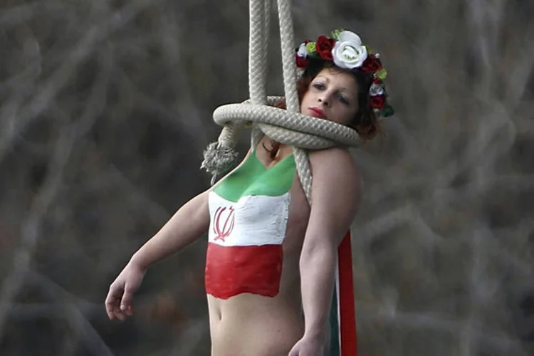 
	Visita iraniana: o grupo quis dar as boas-vindas ao &quot;campe&atilde;o do mundo em execu&ccedil;&otilde;es p&uacute;blicas&quot;
 (Charles Platiau / Reuters)