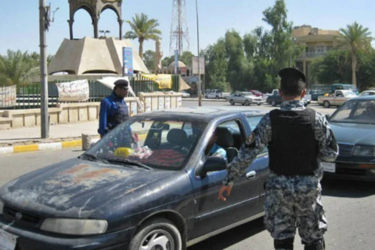 
	Posto de controle em Tikrit, Iraque:&nbsp;MSF criticou ataque sofrido por hospital na cidade
 (AFP / Mahmud Saleh)