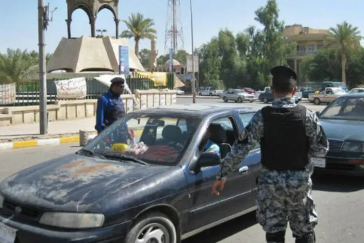 Posto de controle da polícia no centro de Tikrit, no norte do Iraque (AFP / Mahmud Saleh)