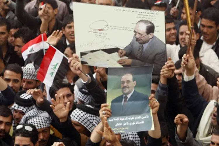 Apoiadores do primeiro-ministro iraquiano, Nuri al-Maliki, em manifestação em Basra, a 420 km de Bagdá (Atef Hassan/Reuters)