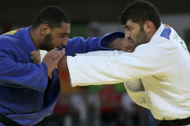
	Or Sasson (Israel) e El Shehaby (Egito): &quot;No passado, uma luta entre esses dois atletas talvez sequer tenha acontecido&quot;
 (Toru Hanai / Reuters)