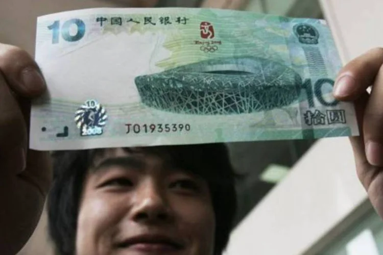 A medida mostra que Pequim acredita que o iuan está perto de seu nível de equilíbrio e que a economia chinesa é robusta o suficiente para aceitar importantes reformas  (China Photos/Getty Images)