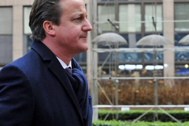 
	O primeiro-ministro brit&acirc;nico, David Cameron: &quot;Francamente, a UE n&atilde;o deve ser imune &agrave;s press&otilde;es que temos para reduzir o gasto&quot;, acrescentou
 (AFP/ Georges Gobet)