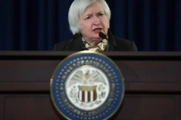 
	A presidente do Federal Reserve Janet Yellen: o banco central deixou a porta aberta para a possibilidade de modesto aperto da pol&iacute;tica monet&aacute;ria ainda este ano
 (Jim Watson/AFP)