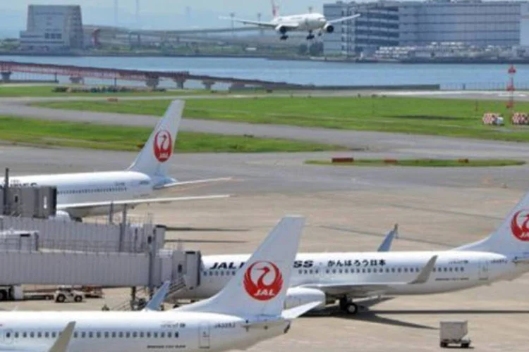 Aviões da Japan Airlines: a JAL irá propor 175 milhões de ações a um preço unitário de entre 3.500 e 3.790 ienes
 (Yoshikazu Tsuno/AFP)