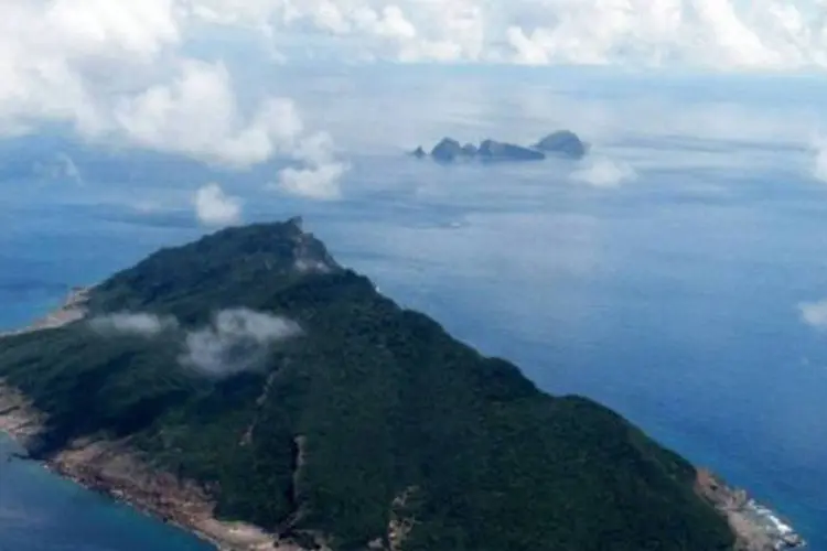 
	As ilhas disputadas s&atilde;o chamadas de Diaoyu pela China e de Senkaku pelo Jap&atilde;o: a embarca&ccedil;&atilde;o com sete pessoas a bordo saiu do norte de Taiwan no in&iacute;cio desta quinta
 (Jiji Press/AFP)