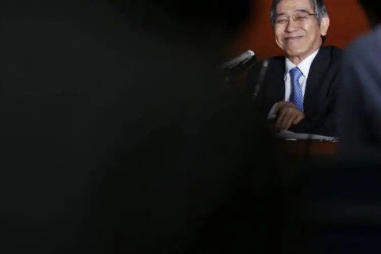 
	O presidente do Banco do Jap&atilde;o (BoJ), Haruhiko Kuroda: &quot;Claramente a economia do nosso pa&iacute;s est&aacute; come&ccedil;ando a se recuperar moderadamente&quot;, disse nesta quinta-feira
 (REUTERS/Toru Hanai)