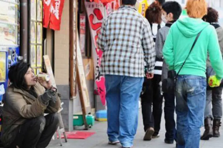 
	Pessoas caminham pelas ruas da metr&oacute;pole japonesa Osaka:&nbsp;&quot;&Eacute; injusto que os Estados Unidos critiquem o Jap&atilde;o silenciando atos que eles mesmos cometeram&quot;, afirmou o pol&iacute;tico nacionalista.
 (Richard A. Brooks)