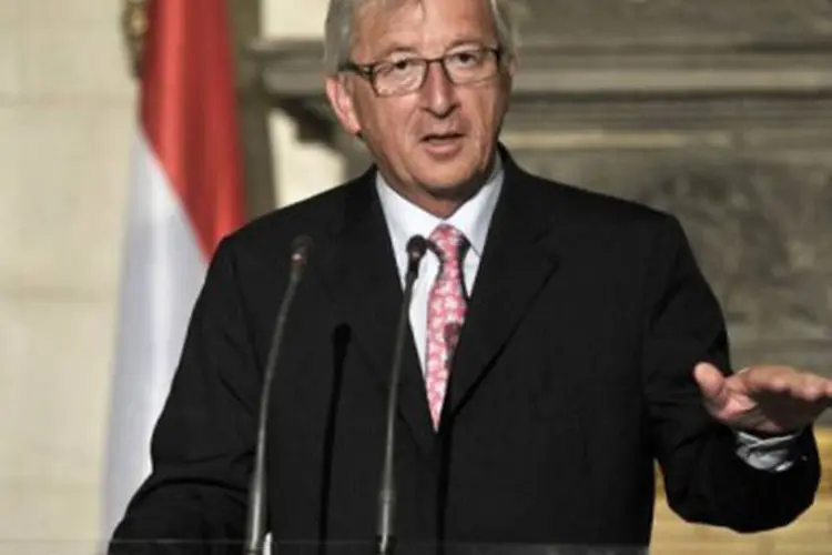 
	Jean-Claude Juncker, o chefe do Eurogrupo: a reuni&atilde;o foi convocada depois que a Corte Constitucional da Alemanha autorizou a ado&ccedil;&atilde;o pelo governo do fundo de resgate
 (Louisa Gouliamaki/AFP)