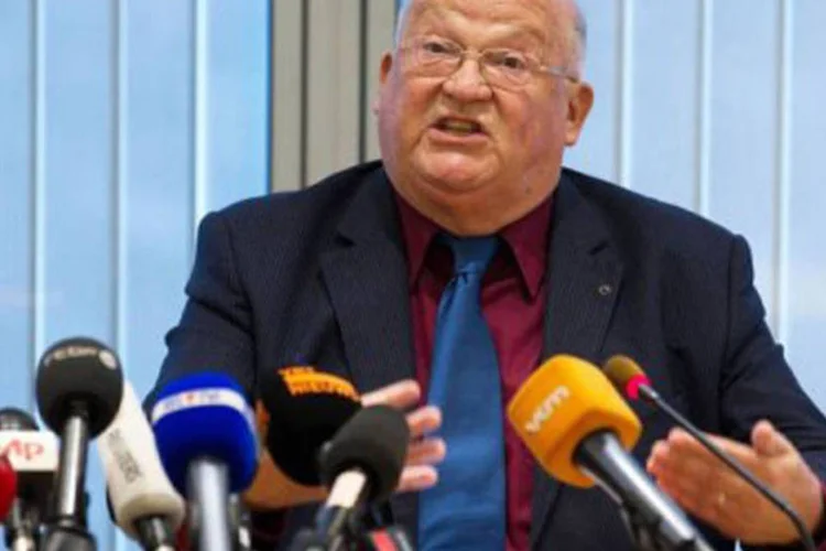 O presidente do conselho de administração do banco, Jean-Luc Dehaene, apresentou nesta segunda-feira sua demissão com efeito imediato (Julien Warnand/AFP)