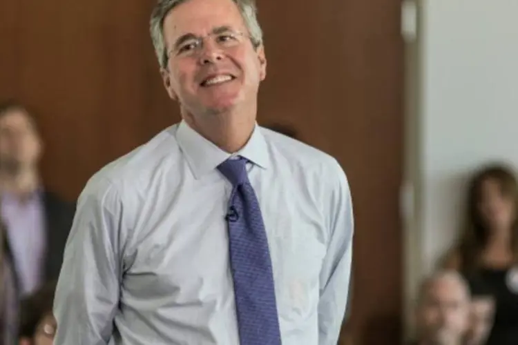 
	Jeb Bush: &quot;Vi em meu irm&atilde;o uma tranquilidade e uma convic&ccedil;&atilde;o indestrut&iacute;veis, e espero que os eleitores tamb&eacute;m vejam isso&quot;, disse George W. Bush
 (Sean Rayford/AFP)