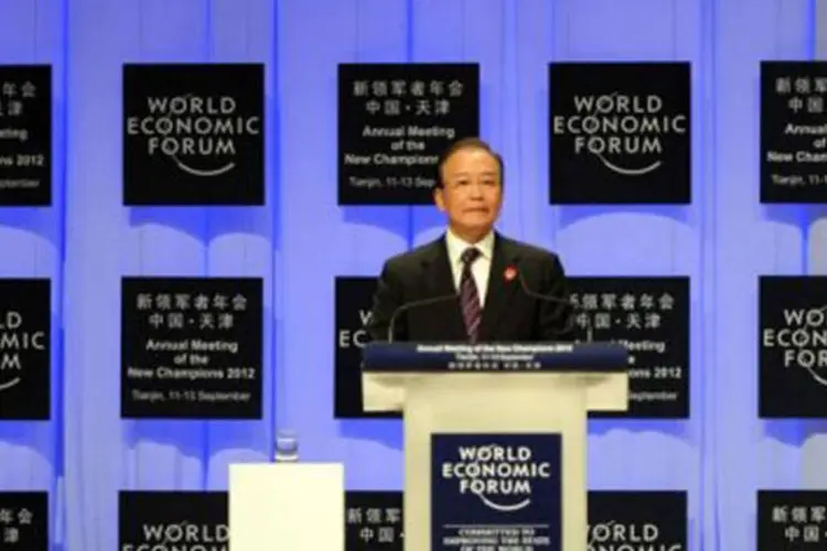 
	O primeiro-ministro chin&ecirc;s, Wen Jiabao, participa do F&oacute;rum Econ&ocirc;mico Mundial: o PIB chin&ecirc;s registrou no segundo trimestre do ano um crescimento de 7,6%
 (Goh Chai Hin/AFP)