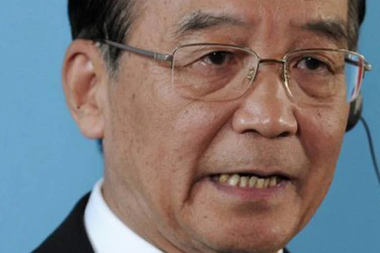 Wen Jiabao: "o que é inquietante é que, por causa de numerosos fatores, a rodada de Doha não avança. O protecionismo registra um forte avanço" (Carl Court/AFP)