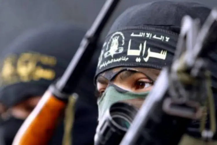 Membros do braço armado da Jihad islâmica, as Brigadas Al-Qods (AFP)