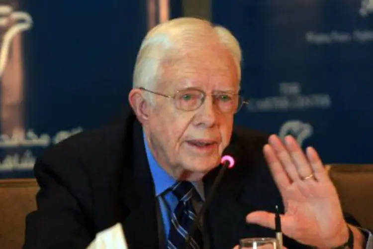 
	O ex-presidente americano Jimmy Carter: &quot;evidentemente, (Carter) defende a uni&atilde;o de esfor&ccedil;os na luta contra o terrorismo e est&aacute; preocupado com o destino do povo s&iacute;rio&quot;
 (Mahmud Hams/AFP)