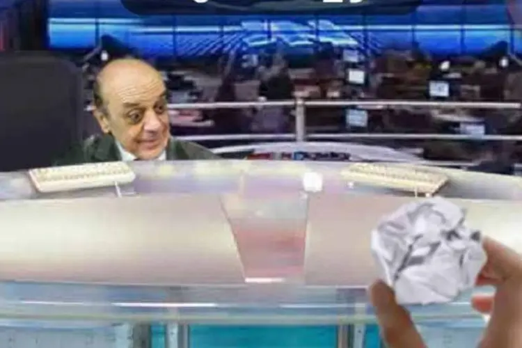 No game, Serra aparece na bancada do Jornal Nacional, da TV Globo (Reprodução)