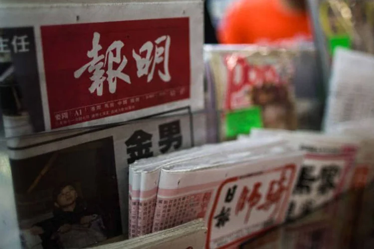 
	Imprensa chinesa: &quot;a China pode se comunicar com o resto do mundo, mas ao mesmo tempo as opini&otilde;es ocidentais n&atilde;o podem entrar t&atilde;o facilmente como ferramentas ideol&oacute;gicas&quot;, argumenta um jornal local
 (Anthony Wallace / AFP)