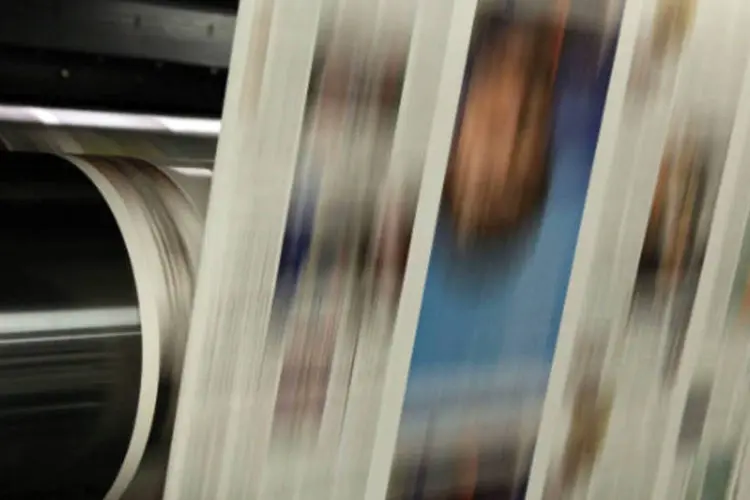 
	Jornais sendo impressos: o jornal foi criado h&aacute; 279 anos em Londres, servindo &agrave; ind&uacute;stria naval no centro do que era ent&atilde;o a maior pot&ecirc;ncia comercial mundial
 (Justin Sullivan/Getty Images)