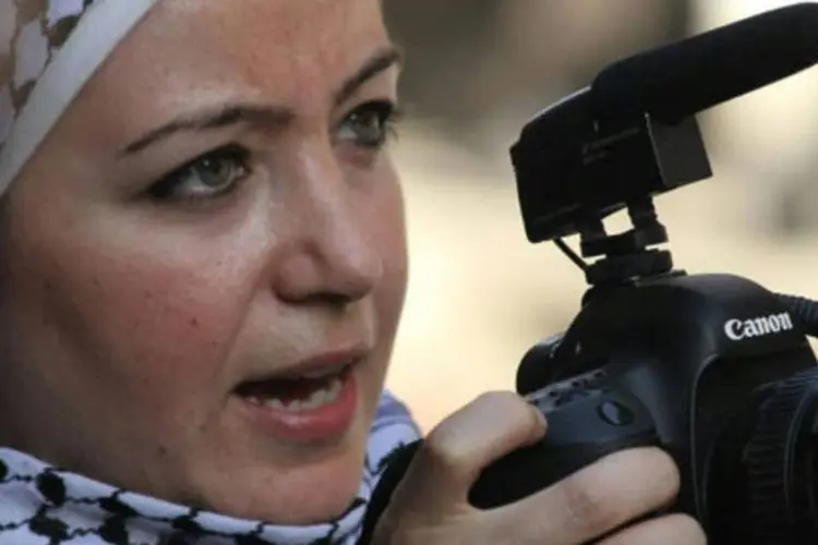
	Zaina Erhaim: foi premiada por sua capacidade de &quot;destacar a dimens&atilde;o humana nos corredores da guerra&quot;
 (PM Award / AFP)