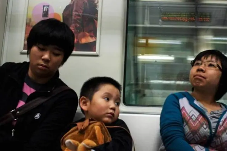 
	Chineses no metr&ocirc;: em 2013, 147 mil imigrantes que moravam nos EUA eram da China
 (Getty Images)
