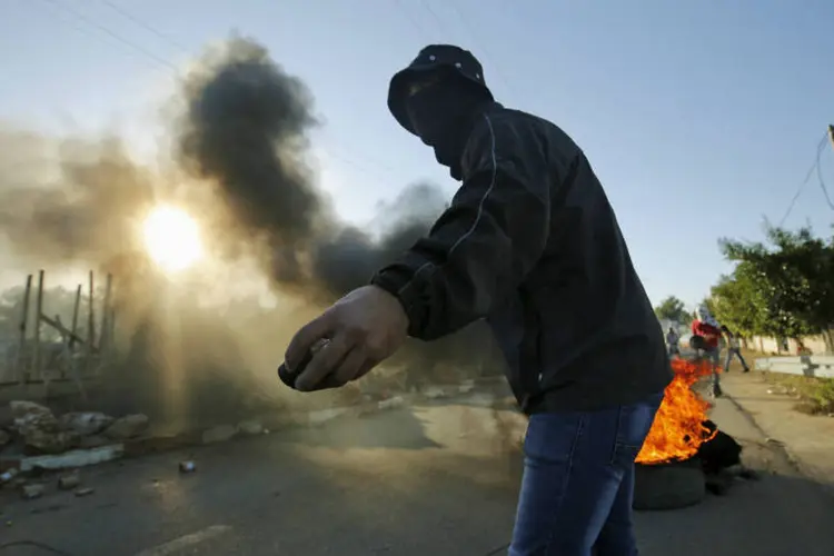 
	Palestino na Cisjord&acirc;nia: O caso de Duma provocou indigna&ccedil;&atilde;o e temor, onde a conviv&ecirc;ncia entre palestinos e colonos &eacute; muito tensa
 (Reuters)