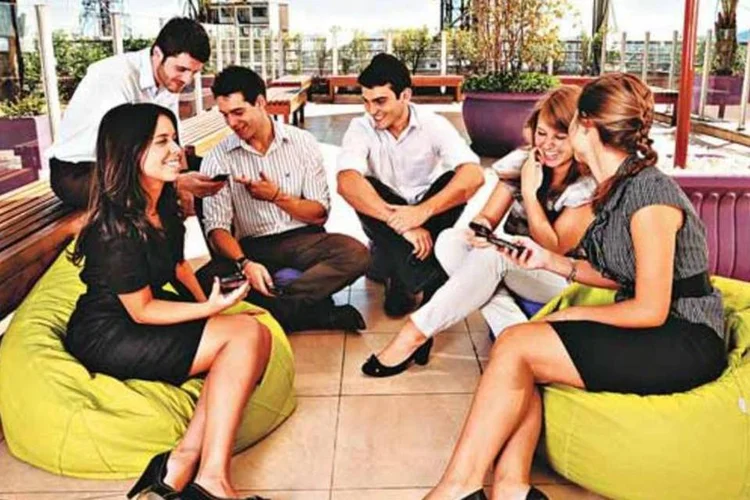 Jovens funcionários da Nextel: satisfação no trabalho:  (Raul Junior/EXAME.com)