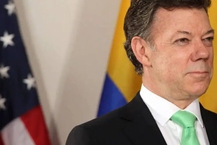 
	Juan Manuel Santos: Santos formalizou ontem &agrave; noite sua inten&ccedil;&atilde;o de concorrer &agrave; reelei&ccedil;&atilde;o
 (Spencer Platt/Getty Images)