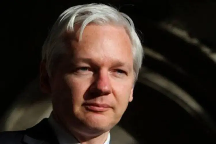 Assange afirmou que a força do programa reside em seu "tom franco e irreverente" (Geoff Caddick/AFP)