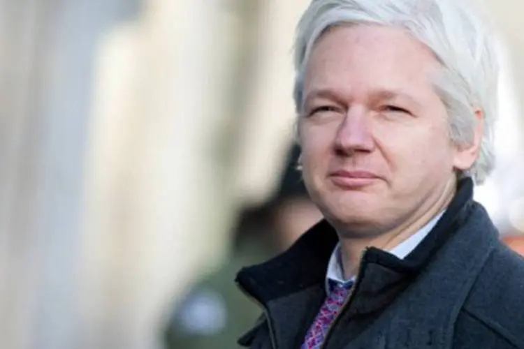 
	Julian Assange: fundador do WikiLeaks, que est&aacute; h&aacute; mais de um ano refugiado na embaixada do Equador em Londres, admitiu ser o respons&aacute;vel pela crise partid&aacute;ria
 (Miguel Medina/AFP)