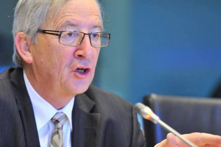 
	Juncker reiterou sua aposta em favor de um plano europeu que dificulte as manobras evasivas das empresas
 (AFP/ Georges Gobet)