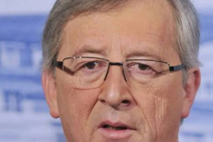 Junker: "é necessário um esforço concertado em escala mundial para assegurar um crescimento forte" (Henning Kaiser/AFP)