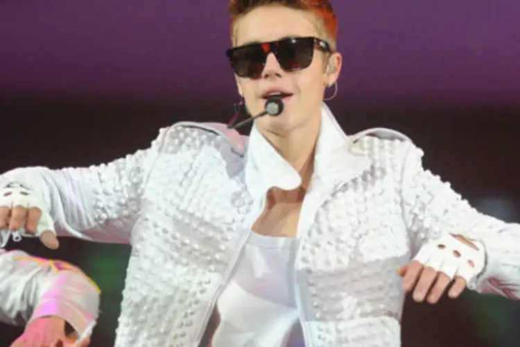 
	Justin Bieber em show em Nova York: durante sua estadia na Argentina, Bieber brigou com fot&oacute;grafos ao sair de um restaurante de Buenos Aires
 (Getty Images)