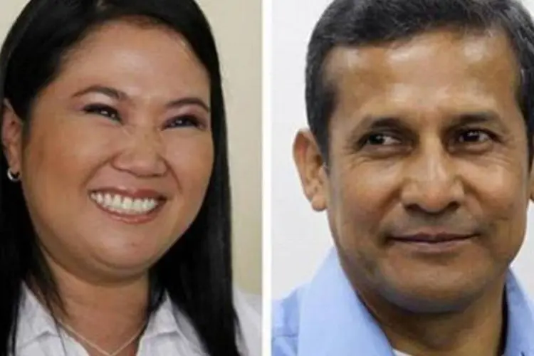 Candidatos à presidência do Peru, Ollanta Humala (dir) e Keiko Fujimori após votarem no primeiro turno das eleições em Lima (Pilar Olivares e Mariana Bazo/Reuters)