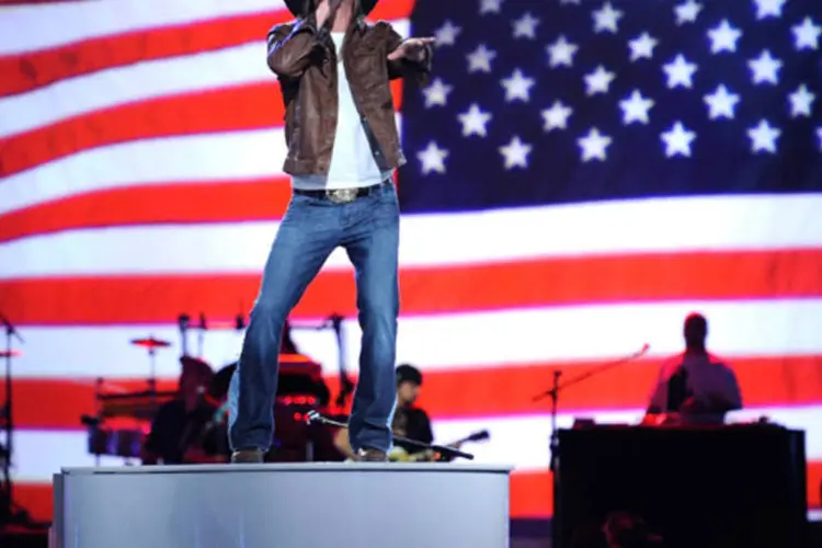 O candidato republicano Mitt Romney usa músicas de Kid Rock (foto), o artista cabeludo que assim como Romney nasceu em Michigan (Ethan Miller/Getty Images)