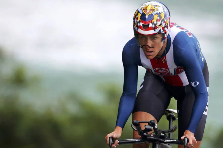 
	Kristin Armstrong: ela &eacute; a primeira pessoa a vencer o mesmo evento de ciclismo de estrada em tr&ecirc;s Olimp&iacute;adas
 (Paul Hanna / Reuters)