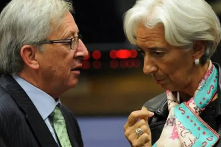 
	Jean-Claude Juncker e Christine Lagarde: dotado de 500 bilh&otilde;es de euros, o MEDE substitui o Fundo Europeu de Estabilidade Financeira
 (John Thys/AFP)
