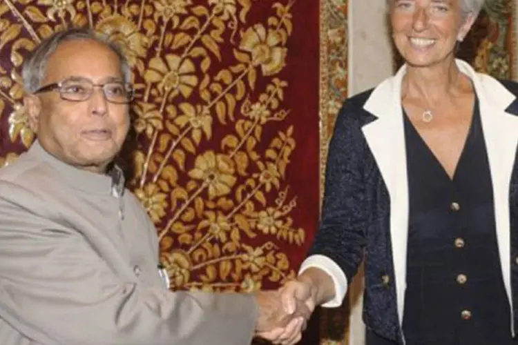 Christine Lagarde e Pranab Mukherjee, ministro indiano das Finanças: ela ainda vai se reunir com o primeiro-ministro do país
 (Raveendran/AFP)