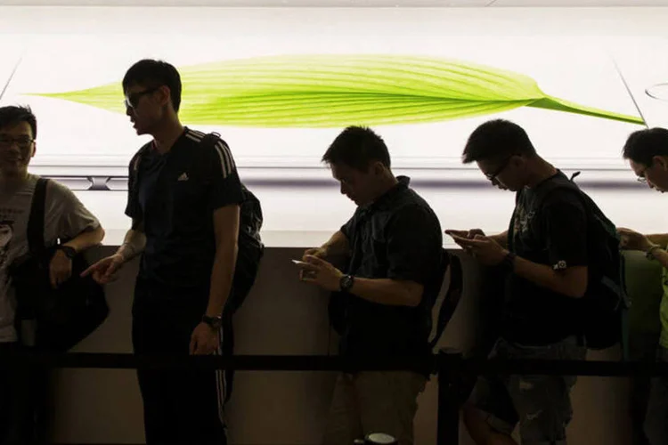 
	Fila: app permite ao usu&aacute;rio acompanhar o tamanho de uma fila para saber quando &eacute; o melhor momento de entrar nela
 (Jerome Favre/Bloomberg)