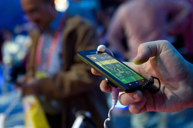 
	Smartphone da Lenovo: ao contr&aacute;rio da Apple, que concentra seus esfor&ccedil;os comerciais no iPhone 5, as lojas da Lenovo t&ecirc;m pelo menos dez modelos da linha IdeaPhone
 (David Paul Morris/Bloomberg)