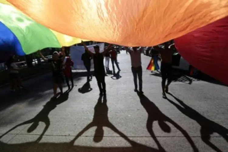 Ativistas da comunidade LGBT participam da parada gay, em Acapulco, México (Pedro Pardo/AFP/AFP)