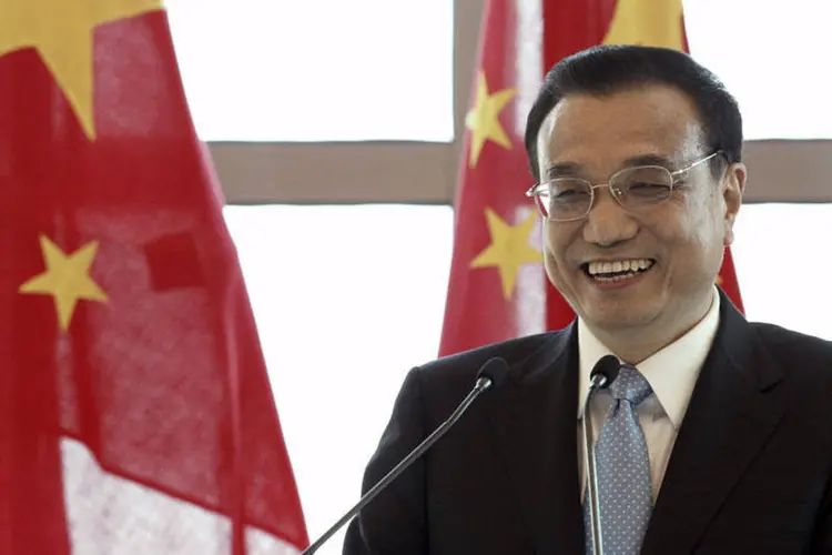 
	O primeiro-ministro chin&ecirc;s, Li Keqiang: Pequim vai oferecer assist&ecirc;ncia &agrave;s pequenas empresas e isen&ccedil;&otilde;es fiscais
 (Goh Seng Chong/REUTERS)