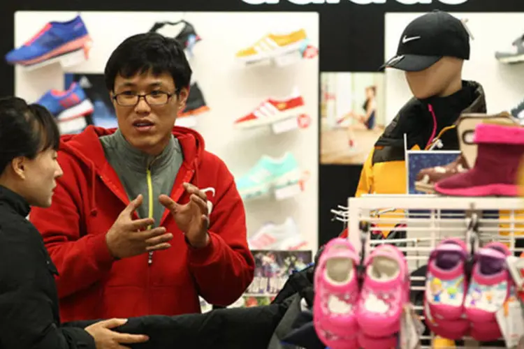 
	Loja da Adidas na Coreia do Sul: vendas do quarto trimestre subiram 3,3 por cento, para 3,48 bilh&otilde;es de euros
 (SeongJoon Cho/Bloomberg)