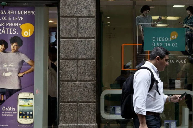 
	Oi: ela pretende comprar da Telecom Italia a TIM do Brasil
 (Dado Galdieri/Bloomberg)