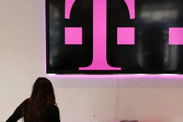 T-Mobile: Deutsche Telekomterá pouco mais de 40% da empresa combinada, mas terá controle de voto (Patrick T. Fallon/Bloomberg)