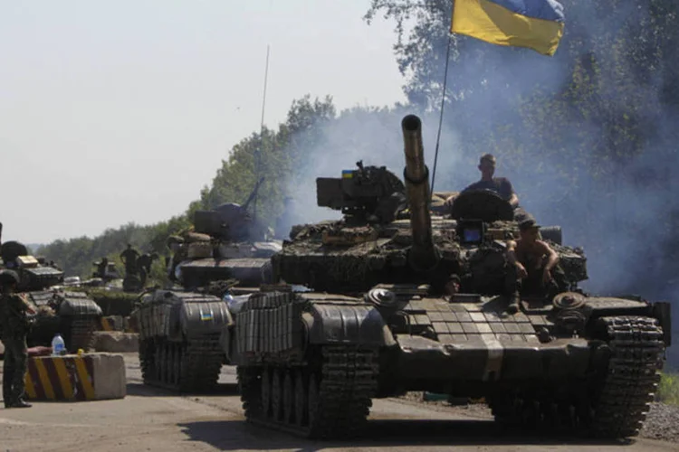 
	Tropas ucranianas em Lugansk: porta-voz dos rebeldes rejeitou acusa&ccedil;&otilde;es
 (Valentyn Ogirenko/Reuters)