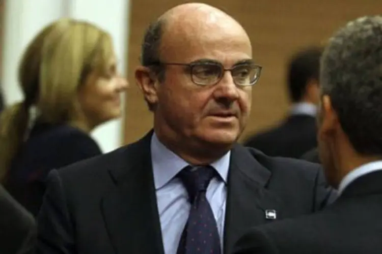 
	O ministro da Economia espanhol, Luis de Guindos, &eacute; visto no encontro de ministros em Nic&oacute;sia, Chipre: ele n&atilde;o revelou detalhes sobre quais setores ser&atilde;o afetados
 (Yiannis Kourtoglou/AFP)