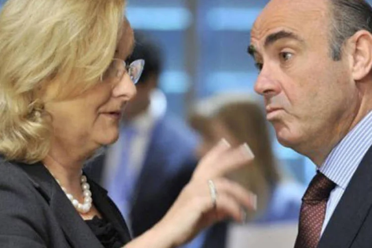 A ministra austríaca, Maria Fekter, e o ministro espanhol da Economia, Luis de Guindos: "é uma mera formalidade", disse o ministro (Georges Gobet/AFP)